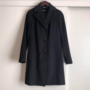 Black long dress over coat 
Calvin Klein